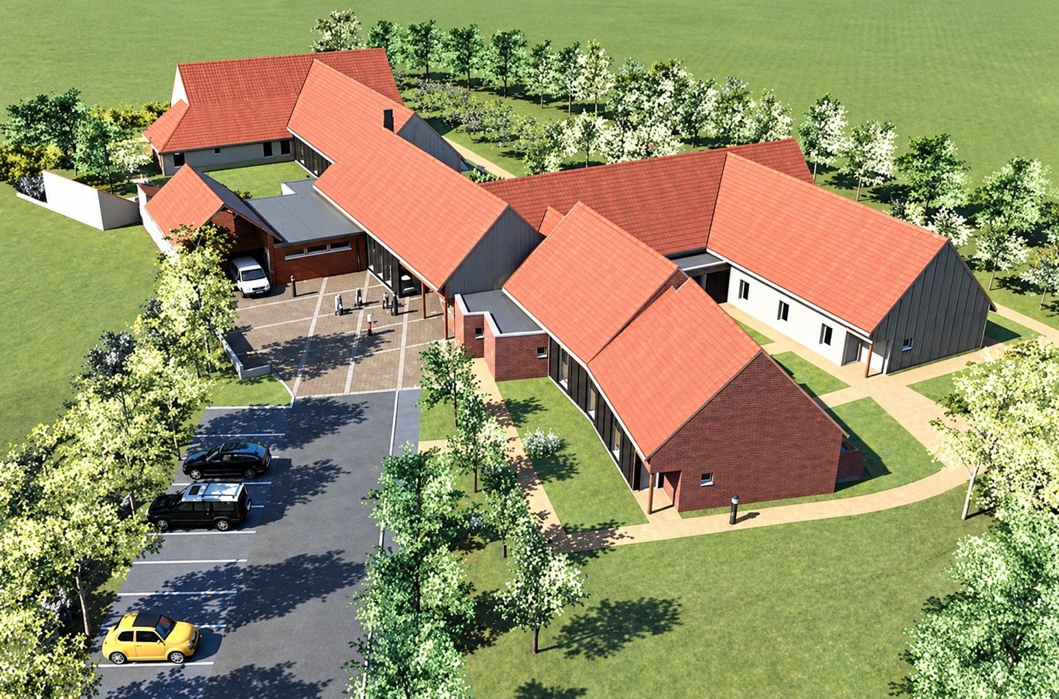 Rendu 3D en vue aérienne d'un ensemble de bâtiments à toits de tuiles rouges entouré d'arbres et de pelouse, avec un parking où stationnent quelques véhicules.